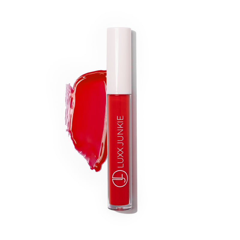 Cherry LUXX Lip Gloss: vegan glossy red coconut-scented lip gloss with packaging