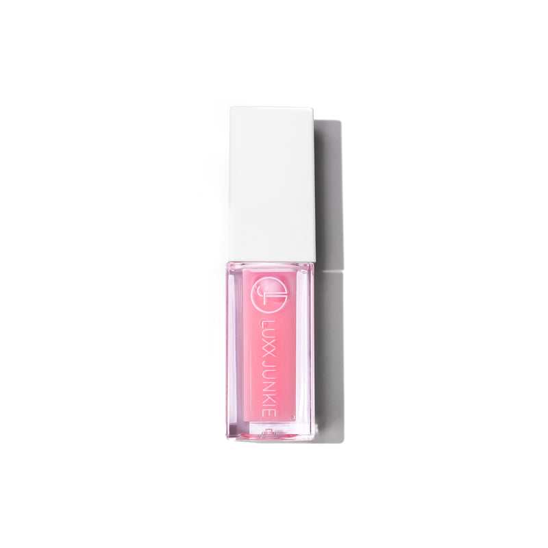 LUXX pH Lip Oil: vegan peach-scented color-changing pH-reactive lip oil with packaging