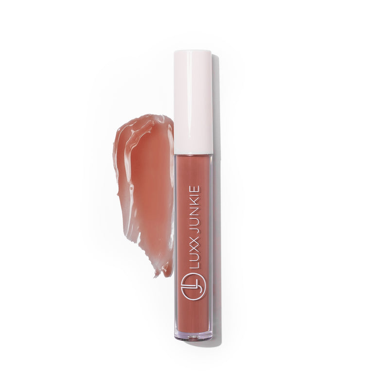Suede LUXX Lip Gloss: vegan warm brown nude coconut-scented lip gloss with packaging