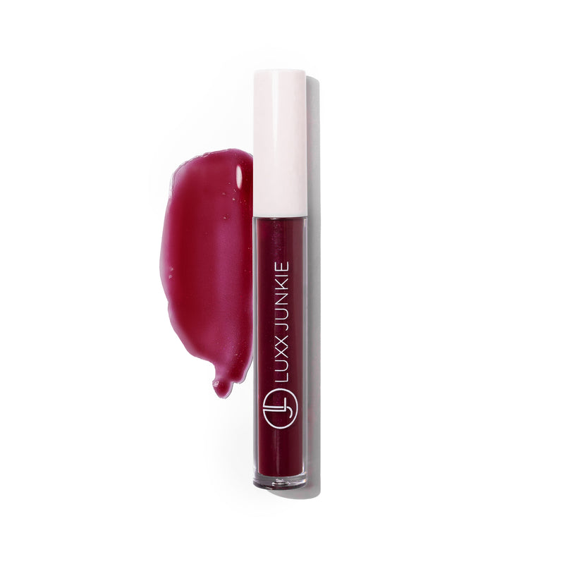 Wine LUXX Lip Gloss: vegan deep berry coconut-scented lip gloss with packaging